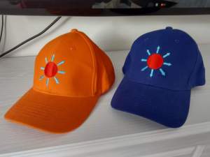 In / out Platonic form orientation equality gravity baseball caps (orange and blue).